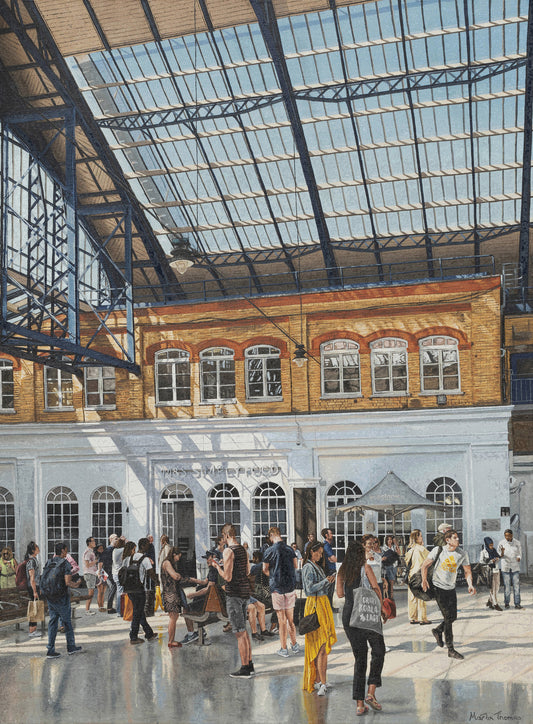 Painting by Martin Thomas of Brighton train station interior with people walking around.