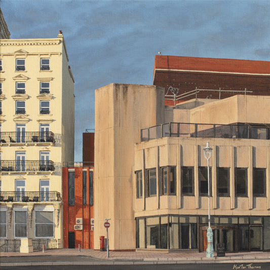 A painting of a Brighton City street scene including The Grand Hotel and The Brighton Centre and a clear sky by Martin Thomas