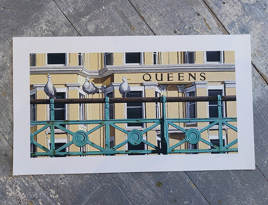 Art Print of the Queens hotel in Brighton facade with 'Queens' and seagulls on a wooden surface