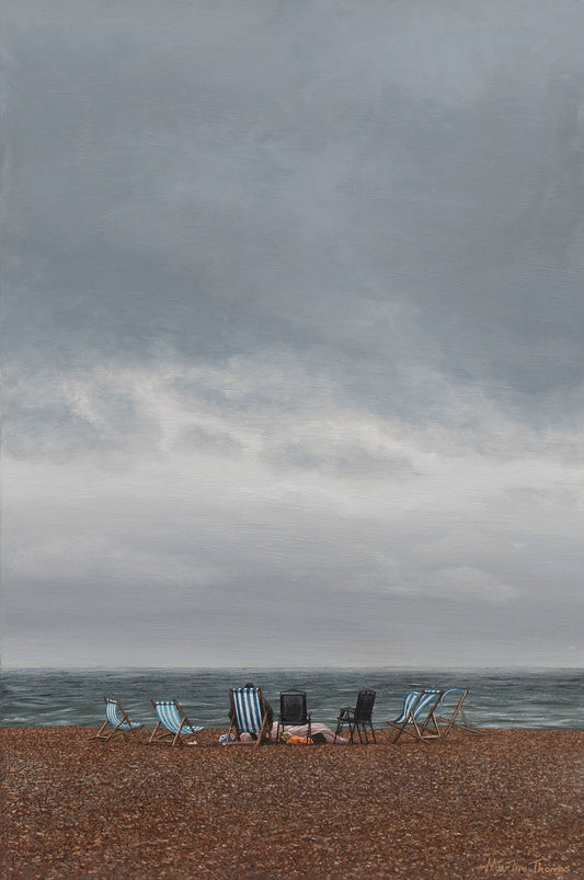 Painting of a Brighton Beach scene with deckchairs under a cloudy sky