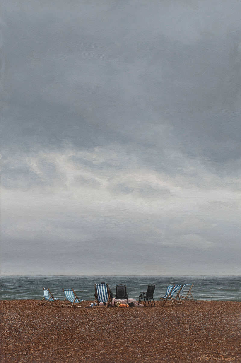 Painting of a Brighton Beach scene with deckchairs under a cloudy sky