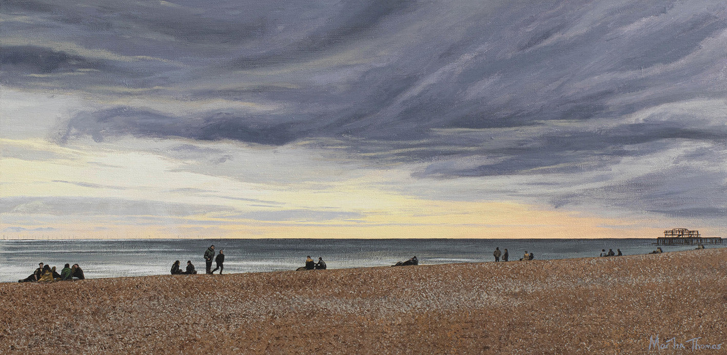 Painting of a Brighton Beach scene by artist Martin Thomas with people under a dramatic sky and the West Pier. Original artwork of acrylic paint on canvas