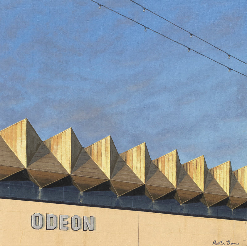 Painting by Martin Thomas of Geometric architectural design on a building in Brighton with 'ODEON' branding against a blue sky.