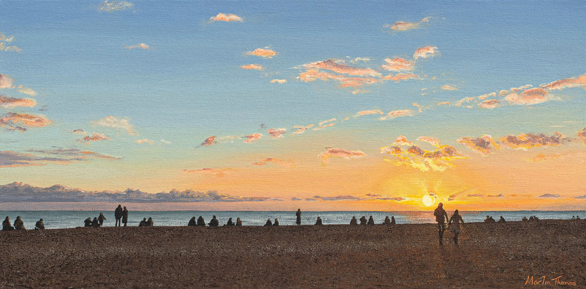 Painting of People on Brighton beach at sunset with a colorful sky by Martin Thomas