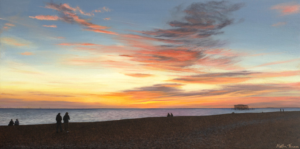 Painting by artist Martin Thomas of a Brighton Beach scene with people watching a sunset over the West Pier