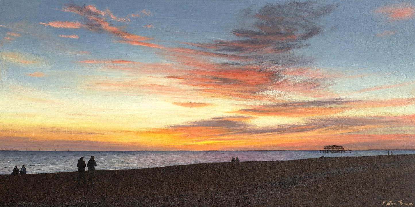 Painting by artist Martin Thomas of a Brighton Beach scene with people watching a sunset over the West Pier