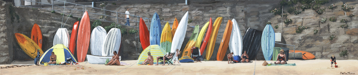 Painting by Martin Thomas of Colorful boats and kayaks lined up on a beach in Mousehole harbour with people sitting nearby.
